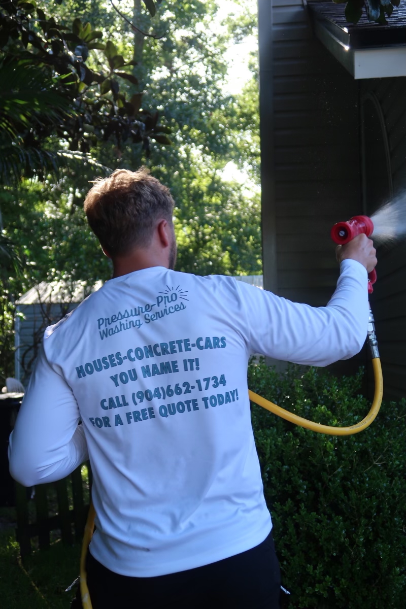 Pressure-Pro team member pressure washing